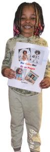 A photo of a 6 year old black boy with braids as a hairstyle holding a Just Like Me Color Pages coloring book. 